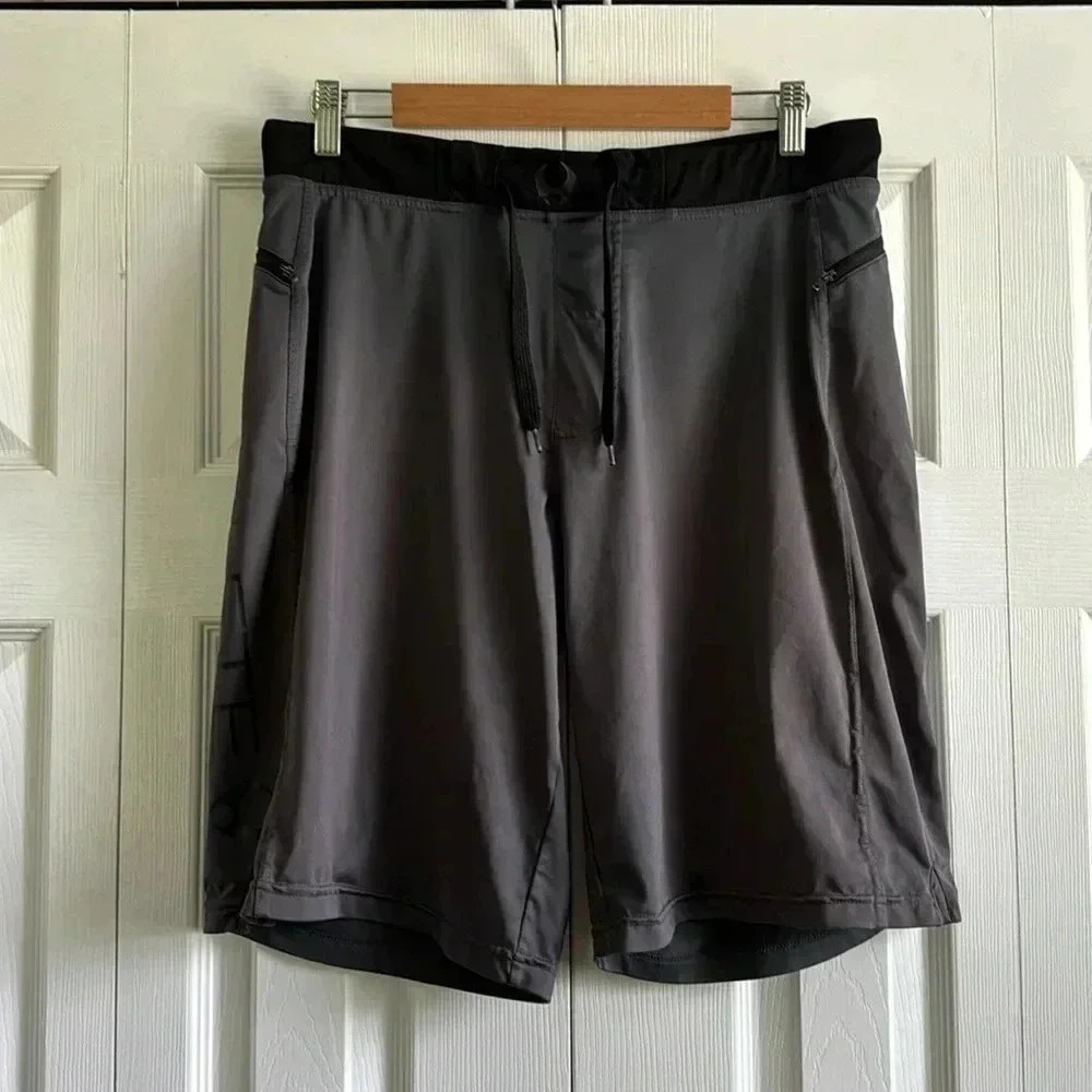 Men's Hylete gray & black athletic Bermuda shorts